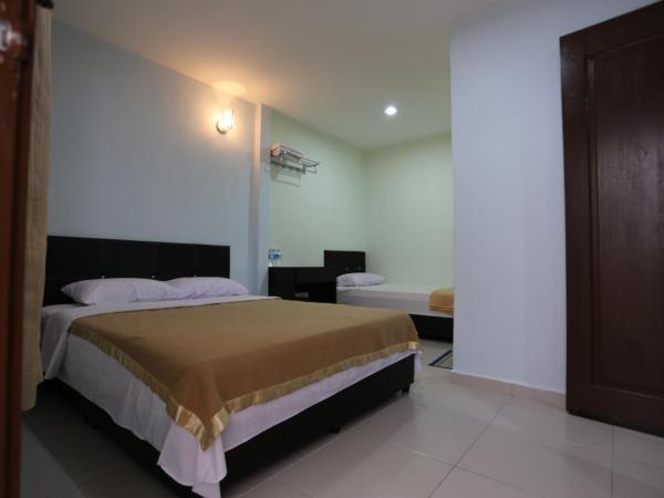 Tengkera Hotel : photo 6 de la chambre chambre triple deluxe