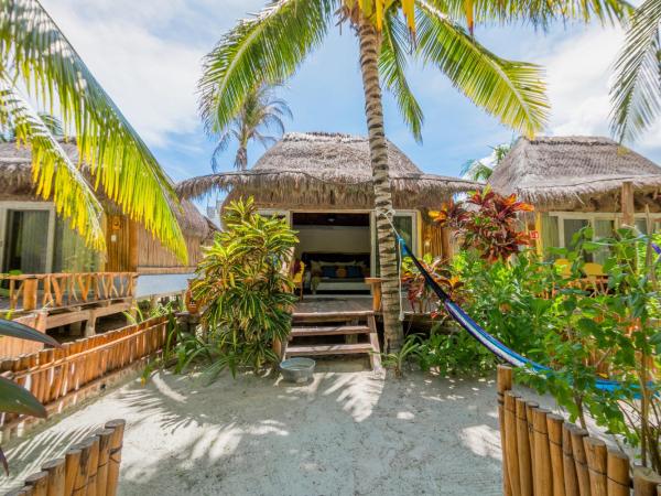 Villa Pescadores Tulum : photo 3 de la chambre chambre lit king-size - vue sur jardin
