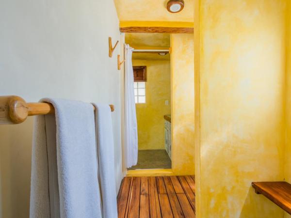 Villa Pescadores Tulum : photo 5 de la chambre chambre lit king-size - vue sur jardin