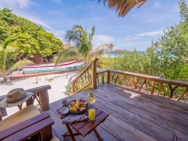 Villa Pescadores Tulum : photo 4 de la chambre suite lit king-size - vue sur océan