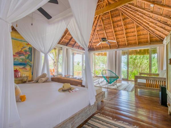 Villa Pescadores Tulum : photo 9 de la chambre suite lit king-size - vue sur océan