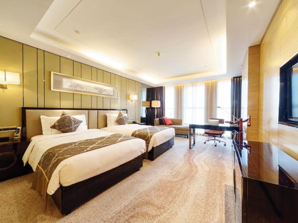 Pullman Wuxi New Lake : photo 2 de la chambre chambre lits jumeaux supérieure