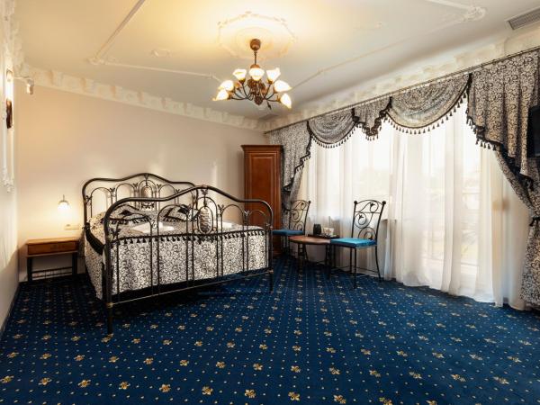 Villa Toscania-check in 24h : photo 1 de la chambre chambre double deluxe avec baignoire