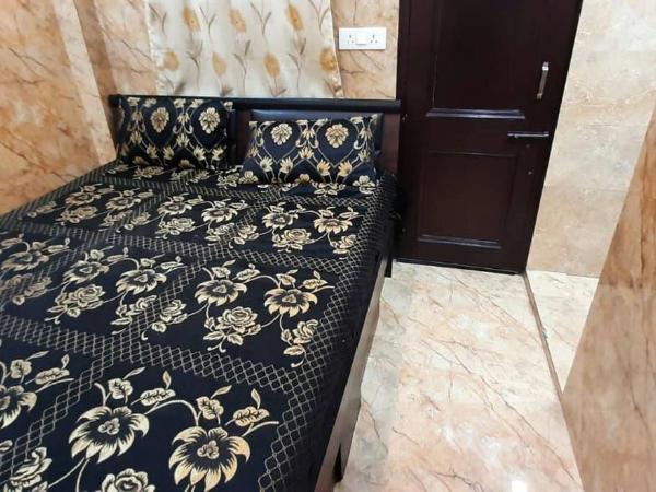 Room in Guest room - Aggarwal Guest House In Cream Location : photo 8 de la chambre chambre quadruple