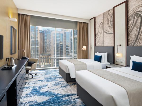 Wyndham Dubai Deira : photo 5 de la chambre chambre lits jumeaux deluxe - vue sur plaza