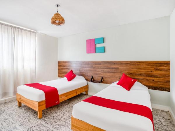 Hotel Suites Puebla : photo 2 de la chambre hébergement quadruple standard