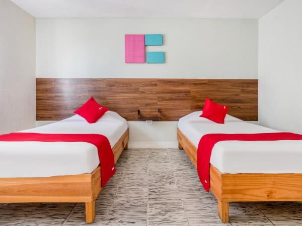 Hotel Suites Puebla : photo 3 de la chambre hébergement quadruple standard