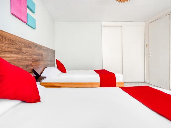 Hotel Suites Puebla : photo 7 de la chambre hébergement quadruple standard