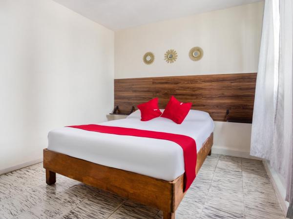 Hotel Suites Puebla : photo 9 de la chambre hébergement quadruple standard