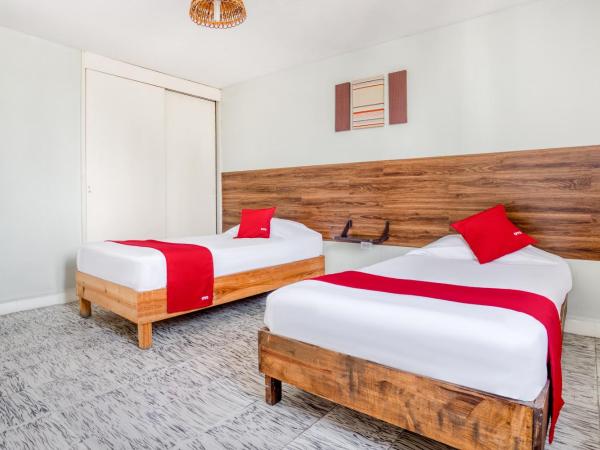 Hotel Suites Puebla : photo 2 de la chambre chambre familiale