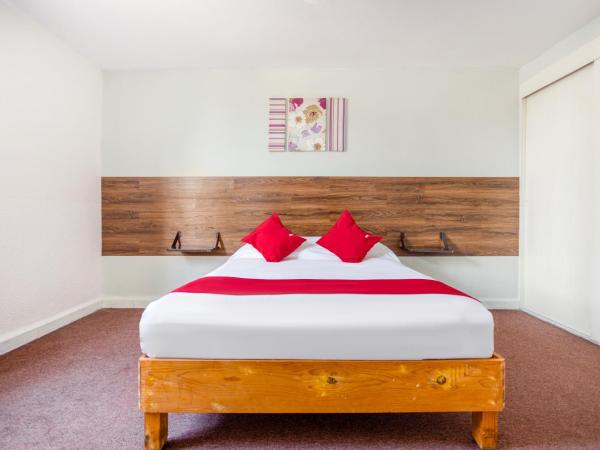 Hotel Suites Puebla : photo 8 de la chambre chambre familiale