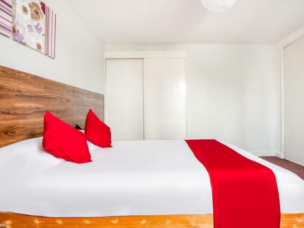 Hotel Suites Puebla : photo 9 de la chambre chambre familiale