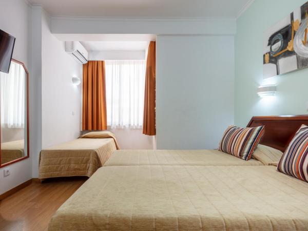 Hotel Anjos : photo 5 de la chambre chambre triple