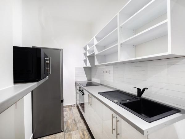 Buda Centre Homes by the Allee Shopping Mall : photo 7 de la chambre chambre double - vue sur jardin