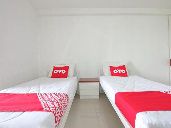 Super OYO 498 Ladawan Villa : photo 2 de la chambre chambre lits jumeaux standard