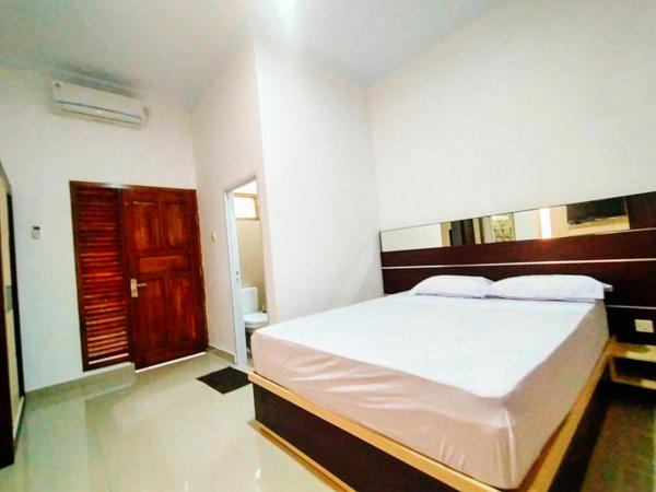 RedDoorz At Artomoro Guest House : photo 1 de la chambre chambre standard