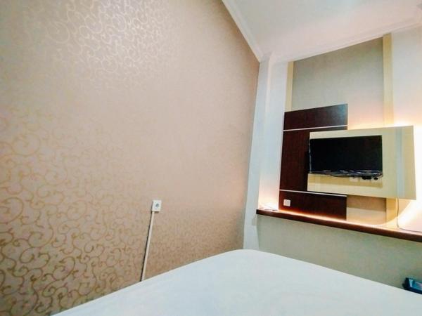 RedDoorz At Artomoro Guest House : photo 5 de la chambre chambre standard