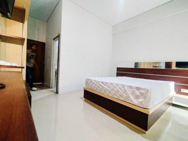 RedDoorz At Artomoro Guest House : photo 6 de la chambre chambre deluxe