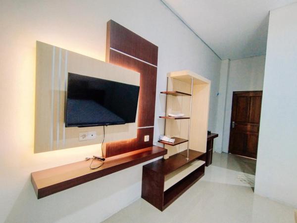 RedDoorz At Artomoro Guest House : photo 5 de la chambre chambre deluxe