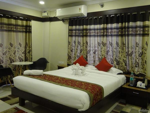 Hotel Rose Mansion Manyata Tech Park : photo 5 de la chambre suite deluxe