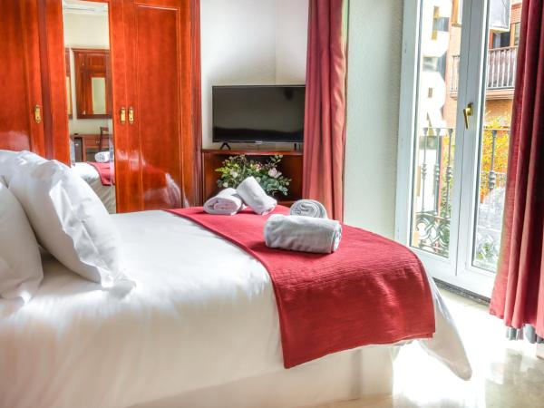 Hotel Reina Cristina : photo 4 de la chambre chambre double ou lits jumeaux