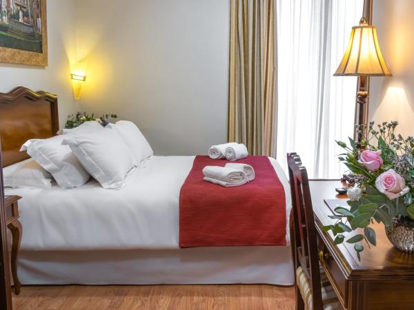 Hotel Reina Cristina : photo 4 de la chambre chambre lits jumeaux deluxe