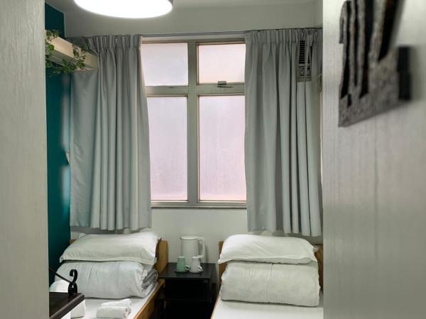 紅館客棧 : photo 4 de la chambre petite chambre lits jumeaux