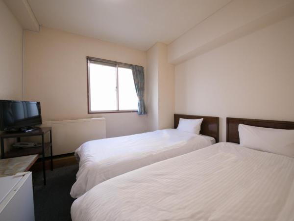 Heiwadai Hotel Arato : photo 3 de la chambre chambre lits jumeaux