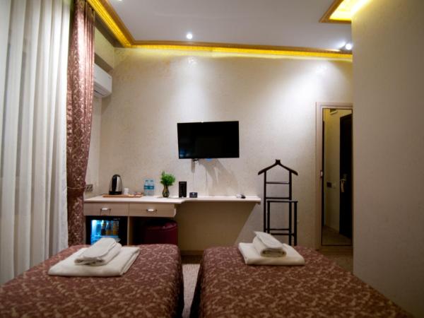 Grand Ambiance Hotel : photo 3 de la chambre chambre lits jumeaux Économique