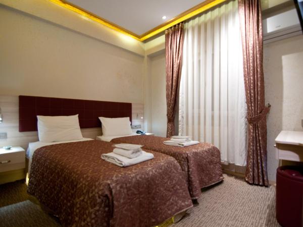 Grand Ambiance Hotel : photo 2 de la chambre chambre lits jumeaux Économique