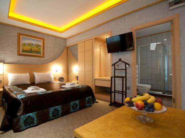 Grand Ambiance Hotel : photo 2 de la chambre chambre familiale deluxe