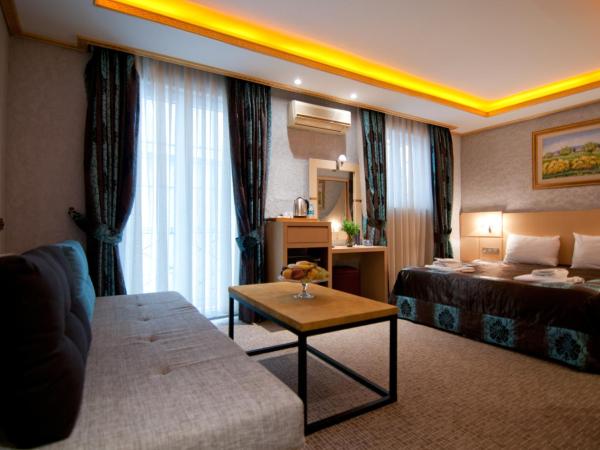 Grand Ambiance Hotel : photo 1 de la chambre chambre familiale deluxe