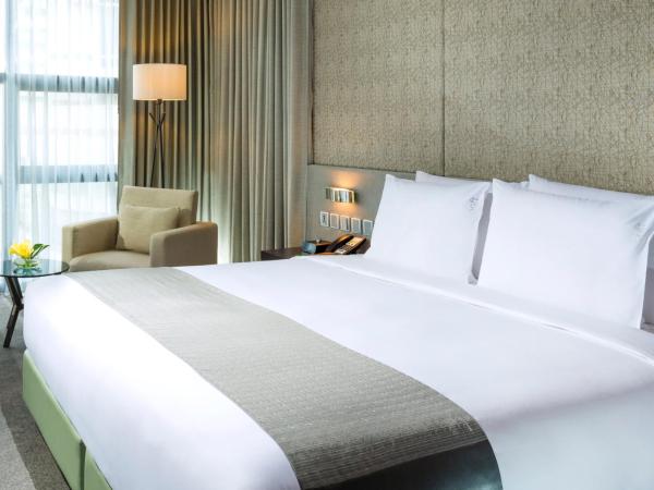Holiday Inn Bangkok Sukhumvit, an IHG Hotel : photo 6 de la chambre chambre lit king-size ou lits jumeaux deluxe