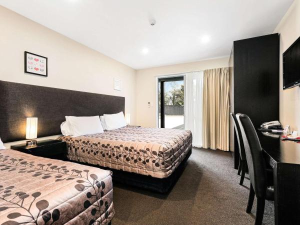 Quality Suites Amore : photo 1 de la chambre standard king room with extra-bed