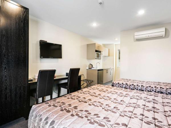 Quality Suites Amore : photo 2 de la chambre standard king room with extra-bed