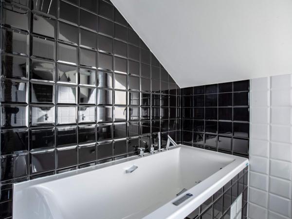 Jehan De Beauce - Teritoria : photo 7 de la chambre suite deluxe avec baignoire spa