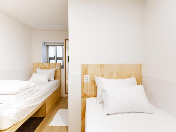 Seoulite Inn Myeongdong Formerly - Step Inn Myeongdong 2 : photo 3 de la chambre chambre lits jumeaux