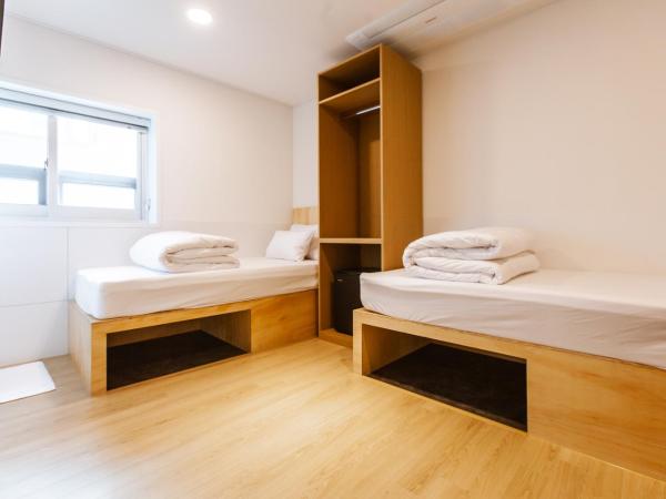 Seoulite Inn Myeongdong Formerly - Step Inn Myeongdong 2 : photo 4 de la chambre chambre lits jumeaux
