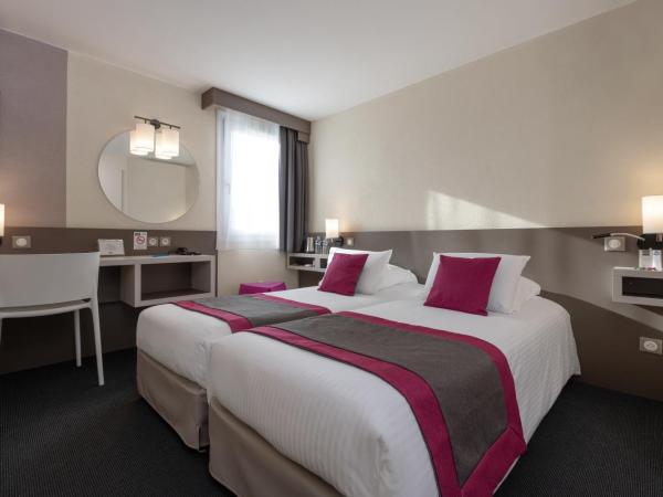 Kyriad Saint-Etienne Centre : photo 2 de la chambre chambre lits jumeaux