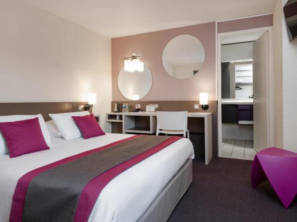 Kyriad Saint-Etienne Centre : photo 1 de la chambre chambre avec 1 lit double 