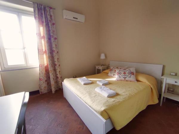 Relais Le Ortensie : photo 3 de la chambre chambre double - vue sur jardin