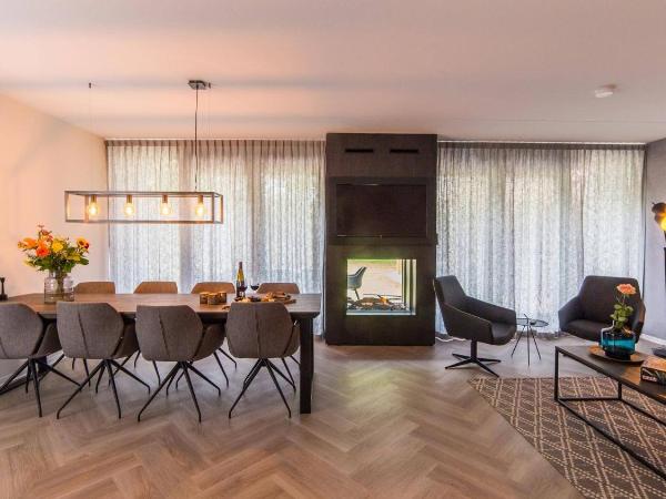 Dormio Resort Maastricht : photo 3 de la chambre villa deluxe au bord de l’eau avec spa et bain à remous