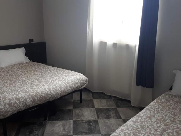 Chiostro Delle Cererie : photo 3 de la chambre chambre triple