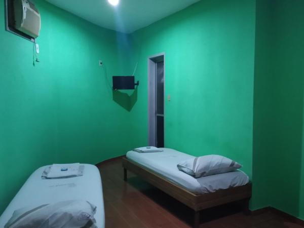 Hotel Barão De Tefé : photo 1 de la chambre chambre quadruple