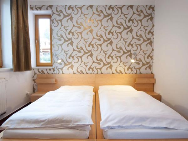 Hotel Garni Pod Skalkou : photo 1 de la chambre chambre lits jumeaux
