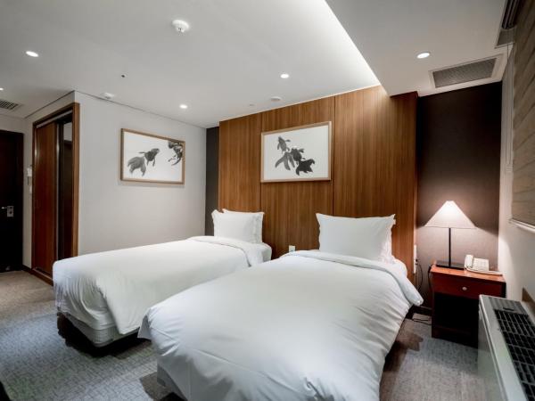 Oriens Hotel & Residences Myeongdong : photo 3 de la chambre chambre lits jumeaux deluxe - sans vue