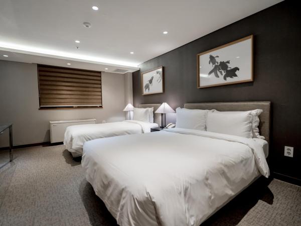 Oriens Hotel & Residences Myeongdong : photo 1 de la chambre chambre triple deluxe - sans vue 