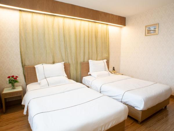 Guangzhou Xin Yue Xin Hotel : photo 7 de la chambre chambre double ou lits jumeaux de luxe 