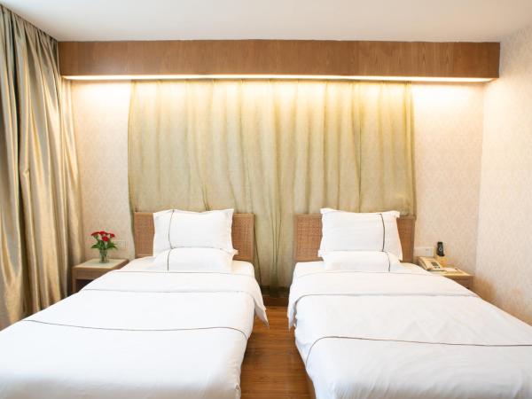 Guangzhou Xin Yue Xin Hotel : photo 8 de la chambre chambre double ou lits jumeaux de luxe 