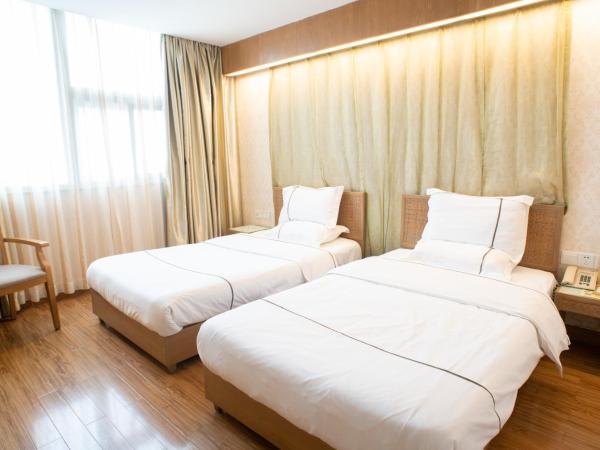 Guangzhou Xin Yue Xin Hotel : photo 5 de la chambre chambre double ou lits jumeaux de luxe 
